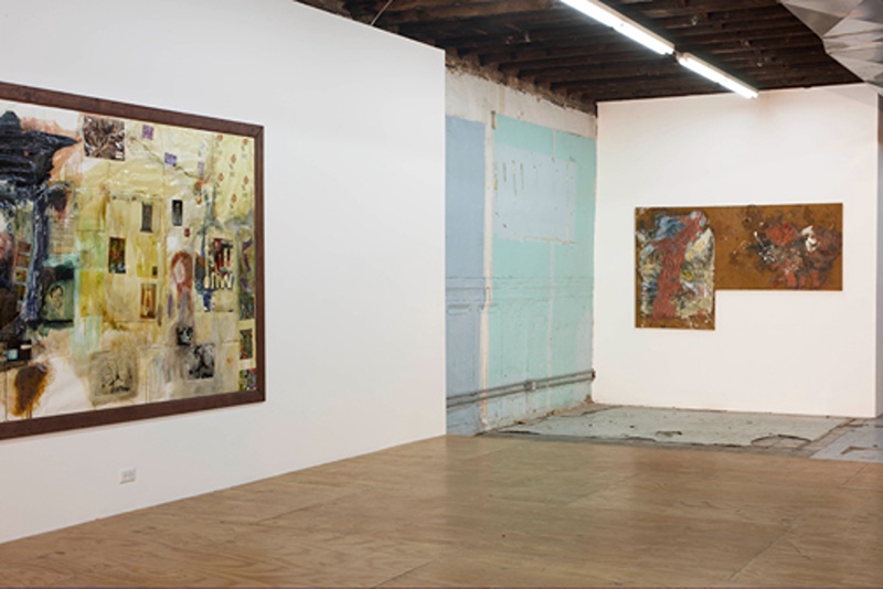 installation shot of corner of gallery with two works